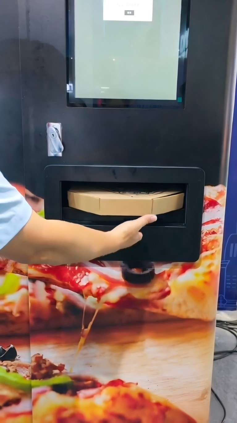 fresh baked pizza output from AZ-P01 pizza vending machine hot crispy crust