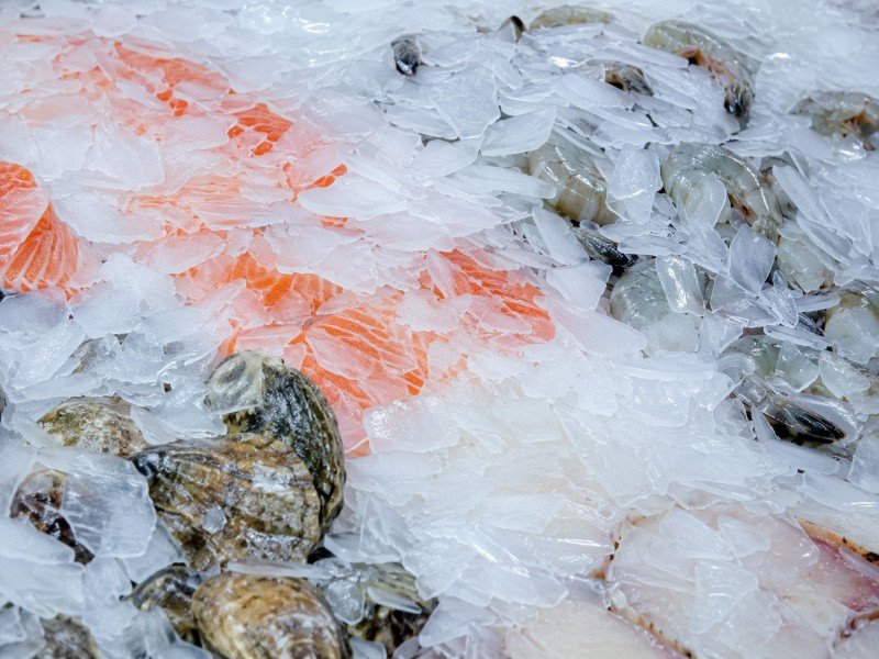 Flake ice on fresh seafood display counter