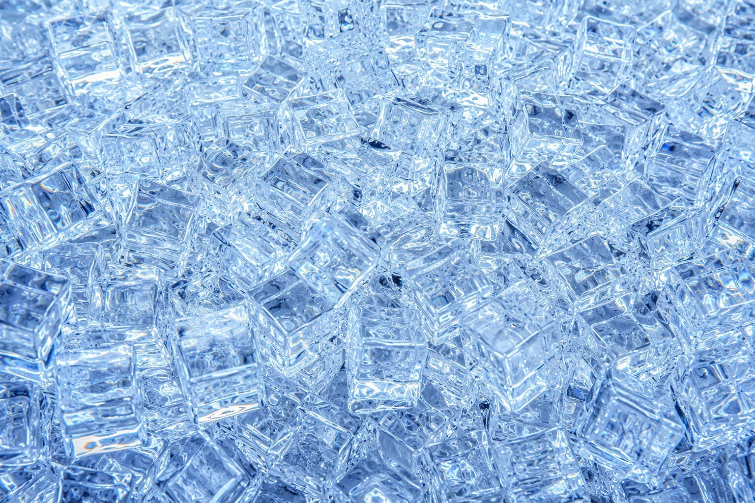 Commercial square cube ice — clear transparent slow-melt ice cubes batch closeup